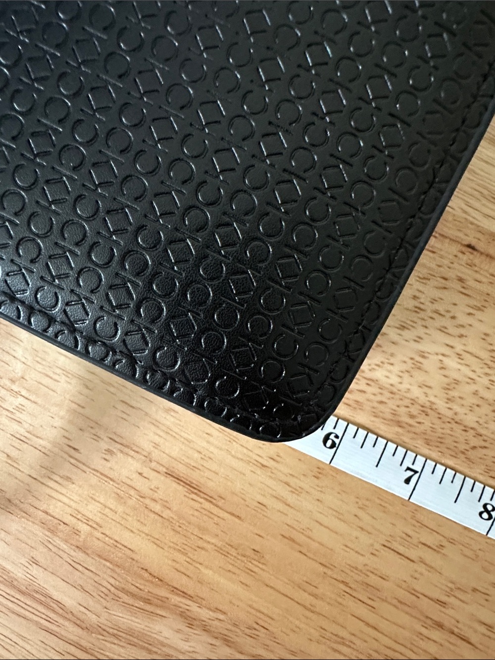 Calvin Klein Black Logo-Embossed Leather Messenger Bag - Picture 6 of 6